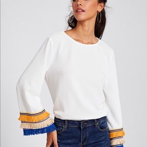 Trendy white top with fringe